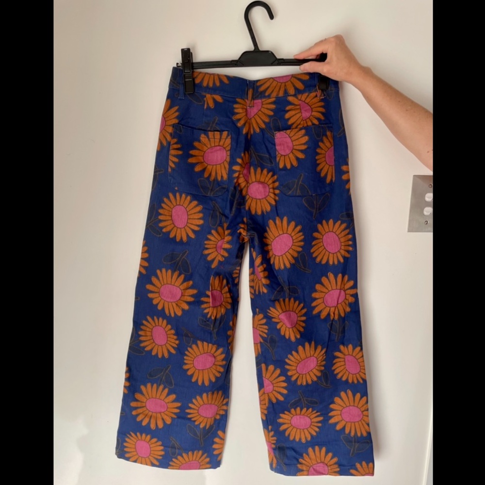 Princess Highway wide-leg jeans. Blue denim with orange & pink flower print. - Picture 2 of 2
